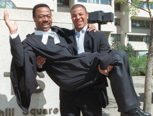 Jarome-Iginla-and-dad graduation Brendon Dlouhy/CANADIAN PRESS/Edmonton Sun