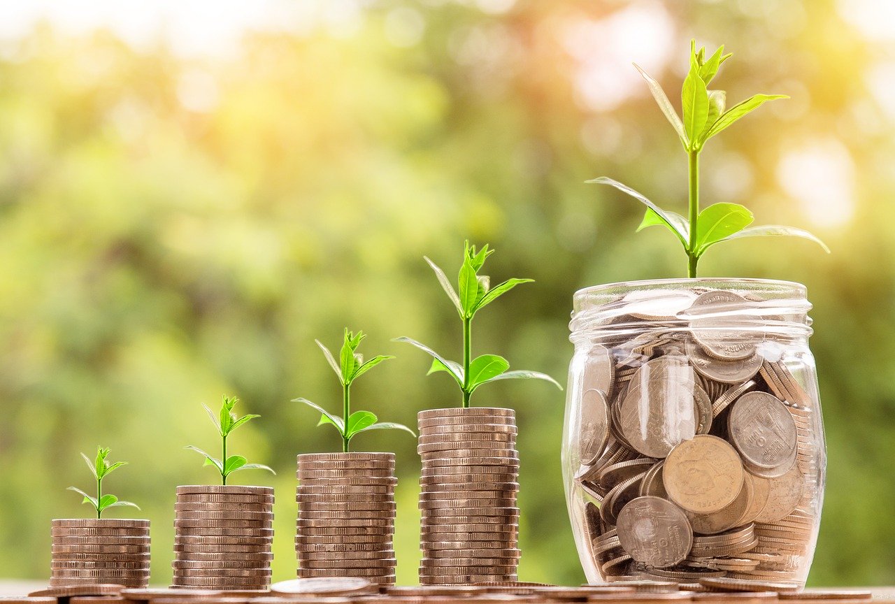 coins in jars growing