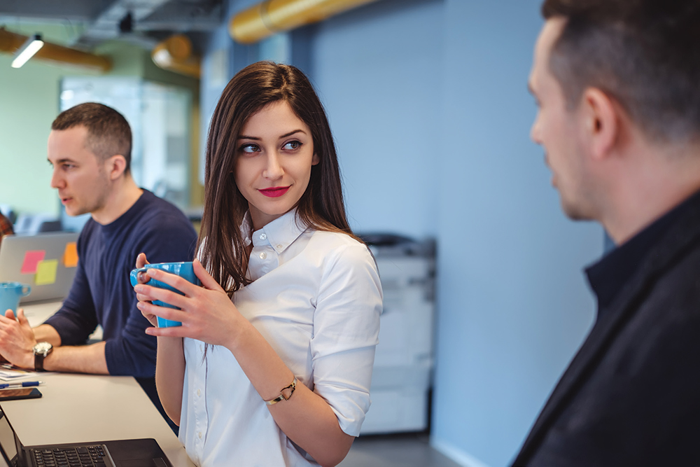 office woman flirting with man