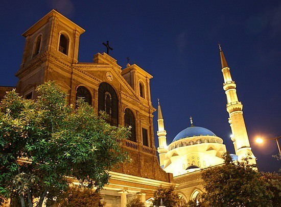 church and mosque at night