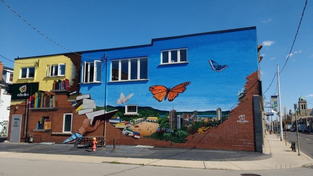 building with images painted on bricks