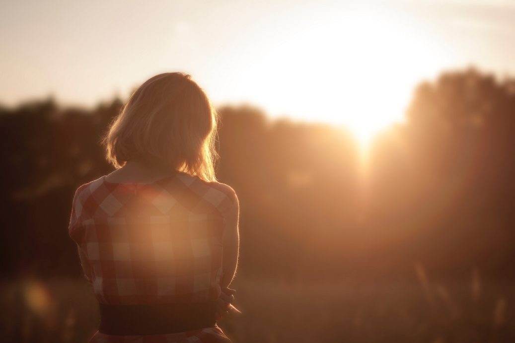 women looking off into the sunset