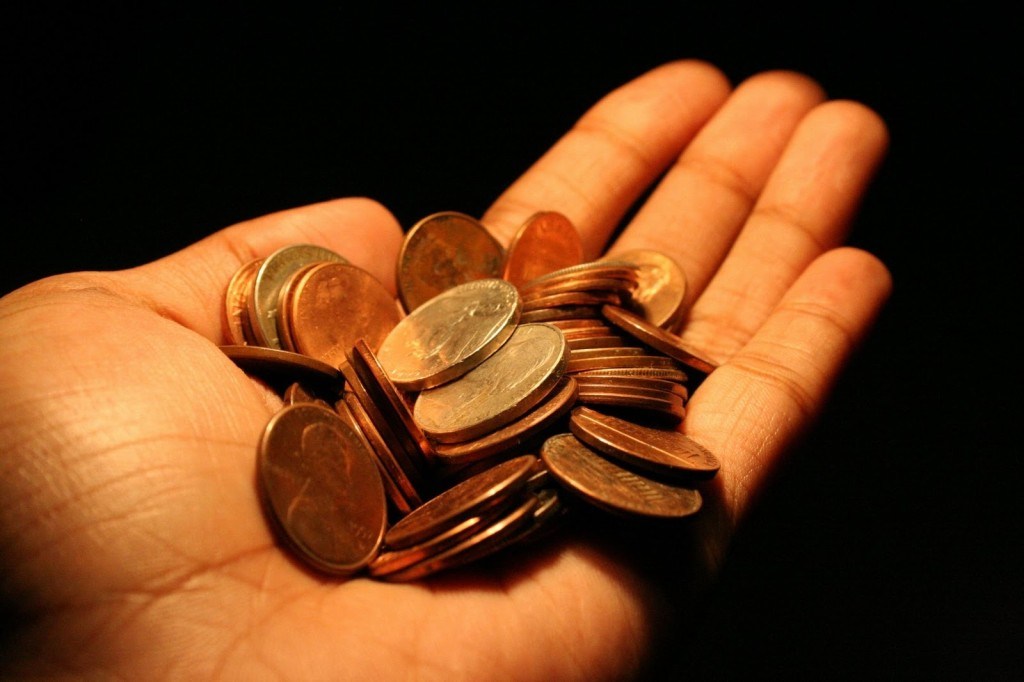 hand with coins