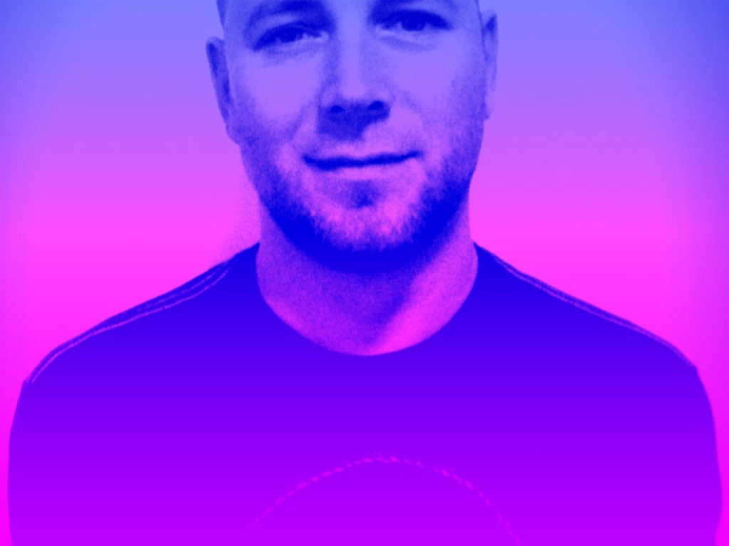 man with blue and pink gradient close up