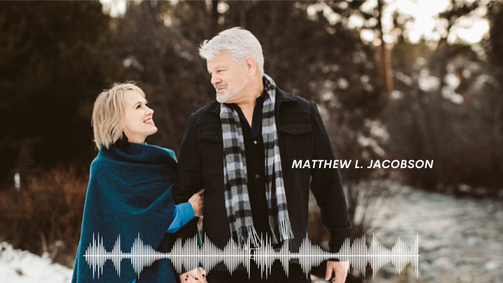 Matthew Jacobson and his wife looking at each other