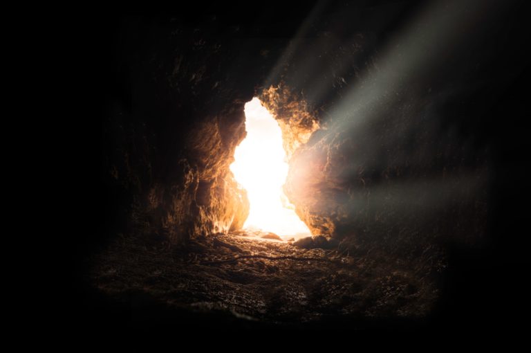 empty tomb with sunlight streaming in