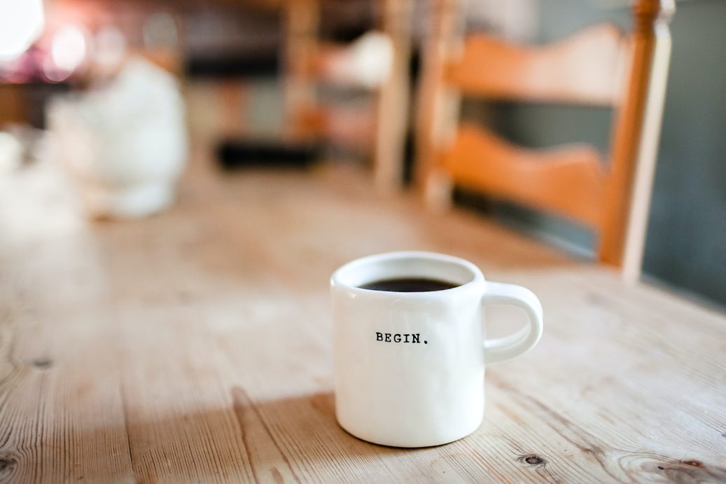 coffee in mug with begin