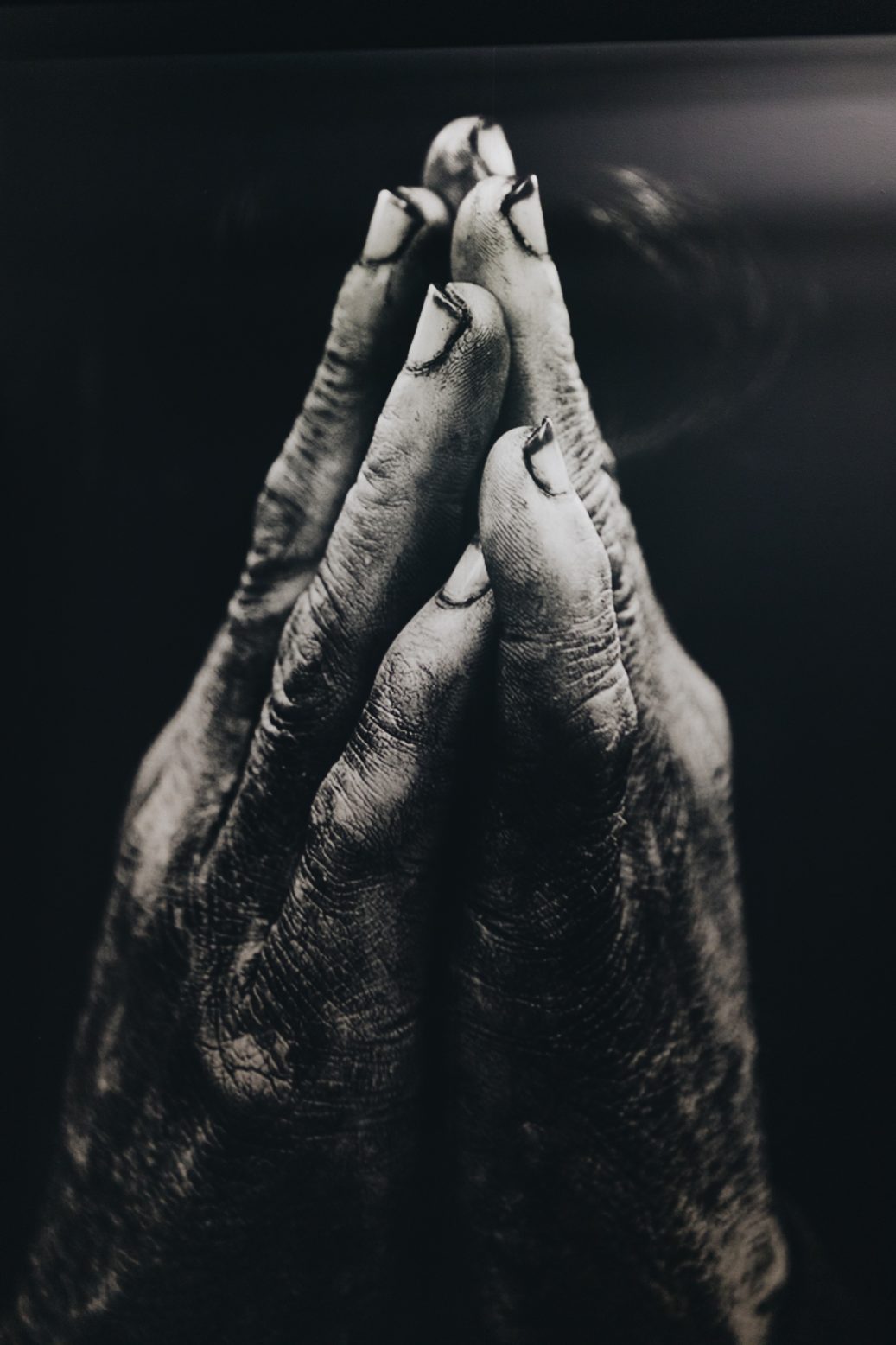 black and white dirty hands praying