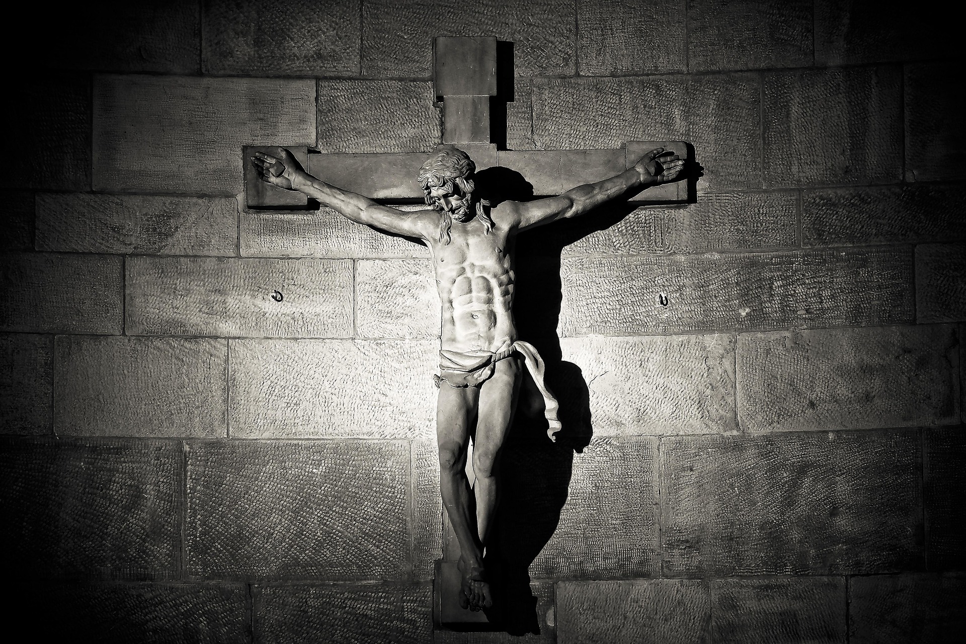 Featured image for “We Worship a God with Scars”
